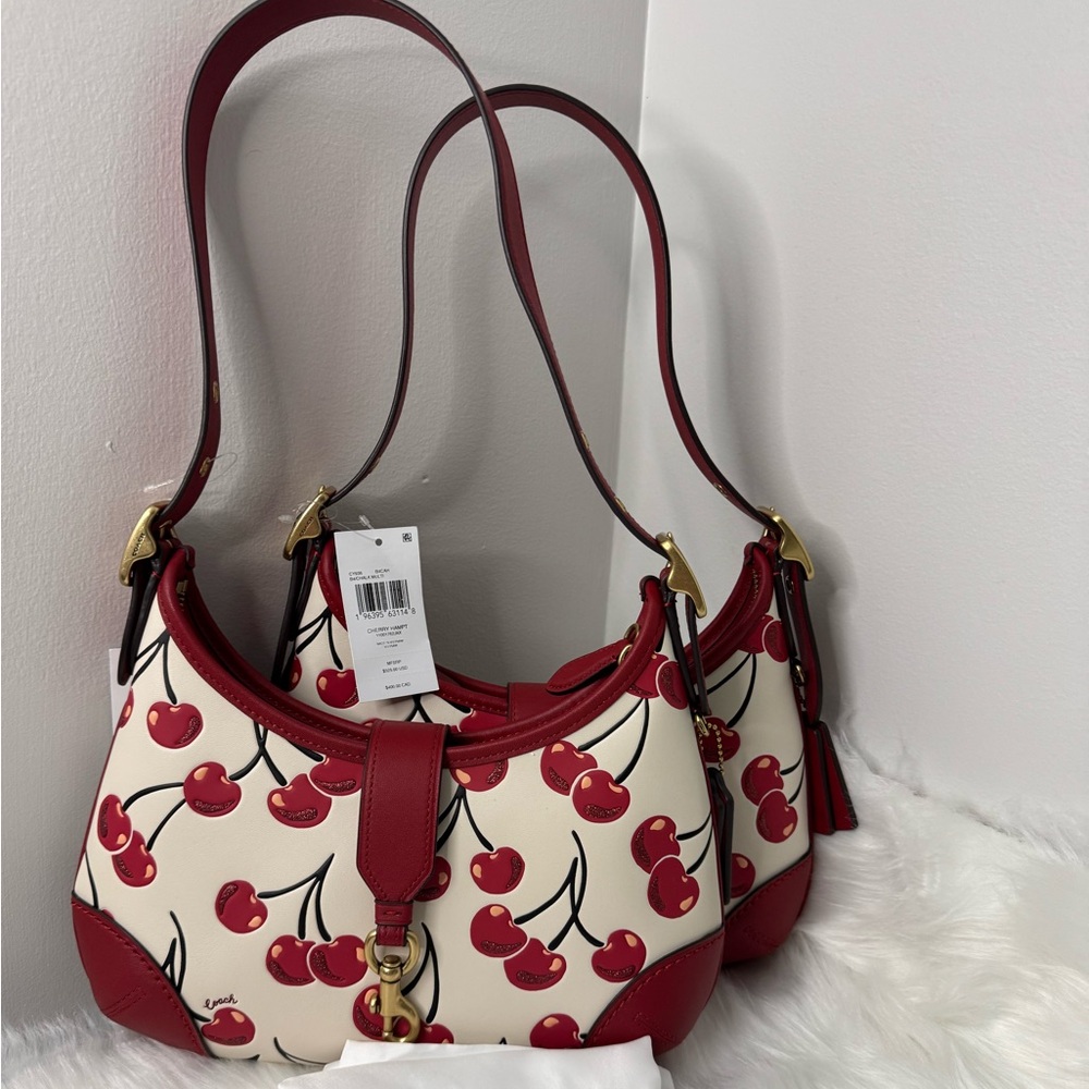 Brand new with Tag Coach Hamptons Hobo  in Cherry Print